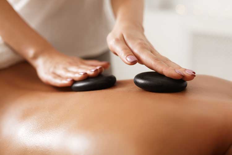 Hot stone massage in Marina